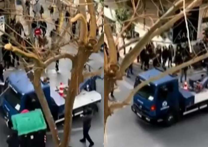 Αντιδράσεις για το βίντεο με τον γερανό της αστυνομίας που παρέσυρε κάδο και χτύπησε διαδηλωτή